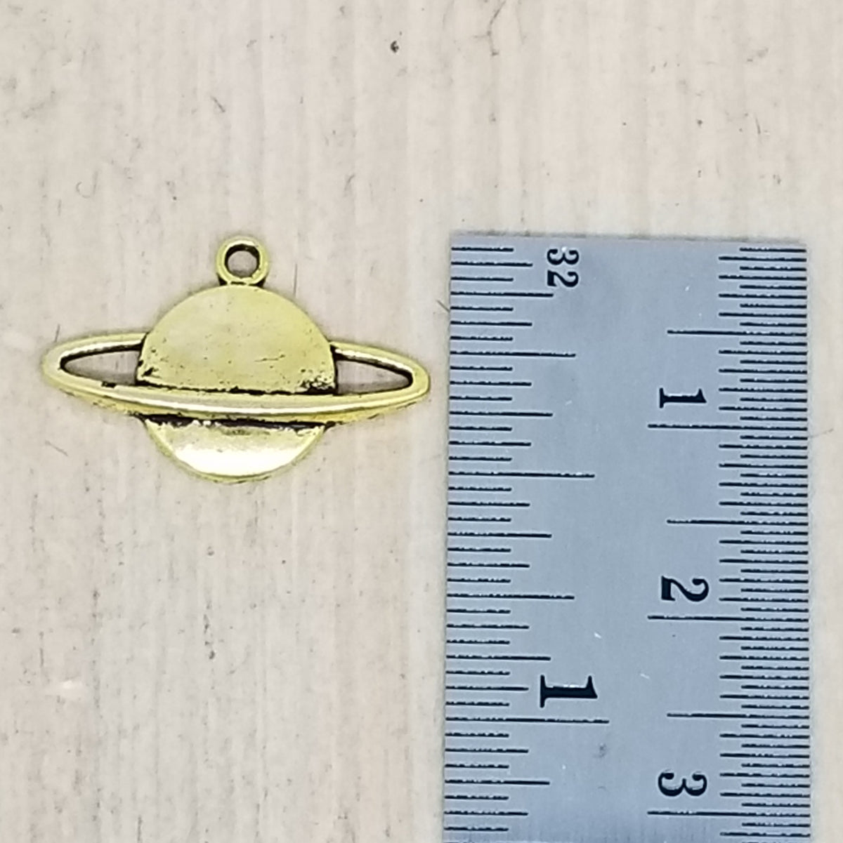 gold planet charm - lot of 5