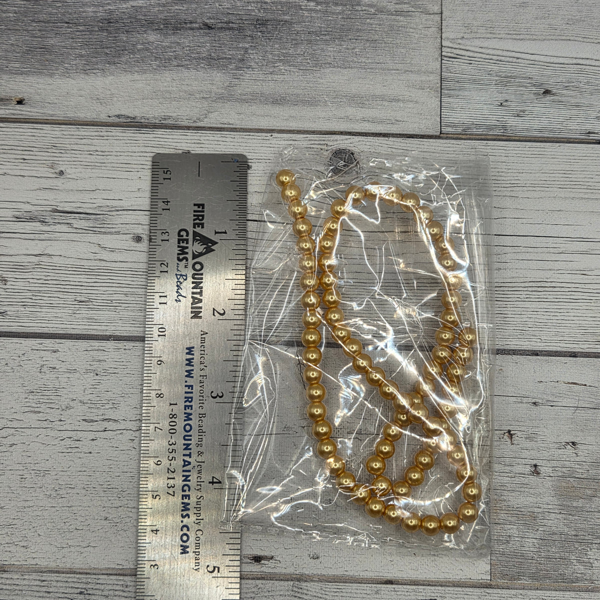 Single Strand 6mm crystal pearls - gold tone - 70 pearls