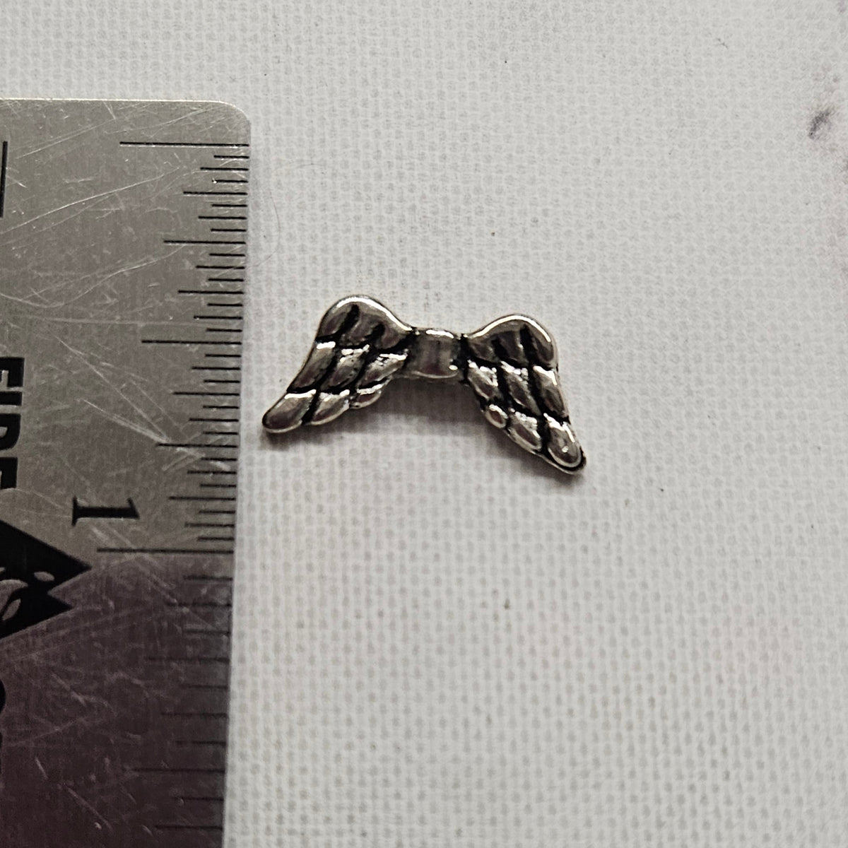 Wing Bead charm silver toned - lot of 9