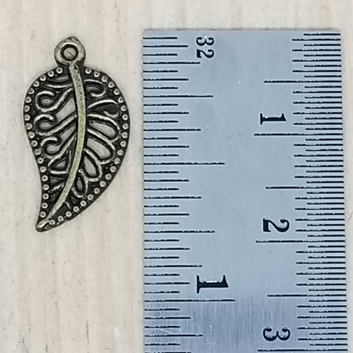 Bronze lacy leaf Charm - lot of 5