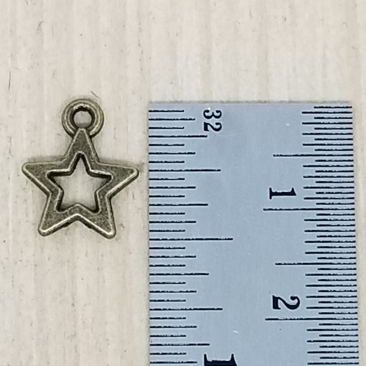 Bronze outline star - lot of 10