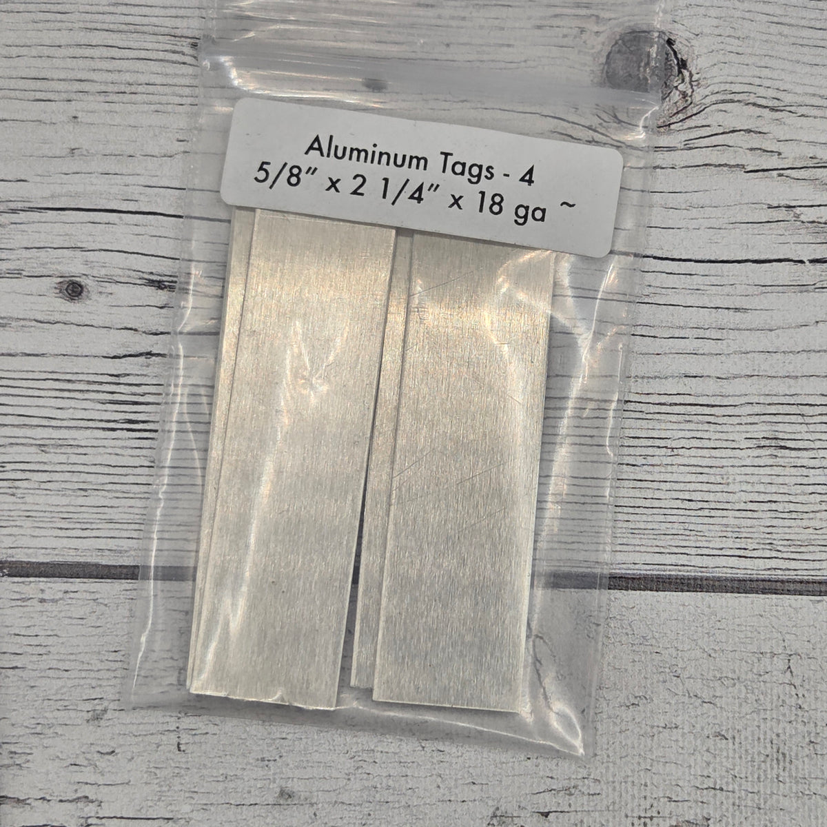 Aluminum tags 5/8" x 2 1/4"  18ga   4 pcs