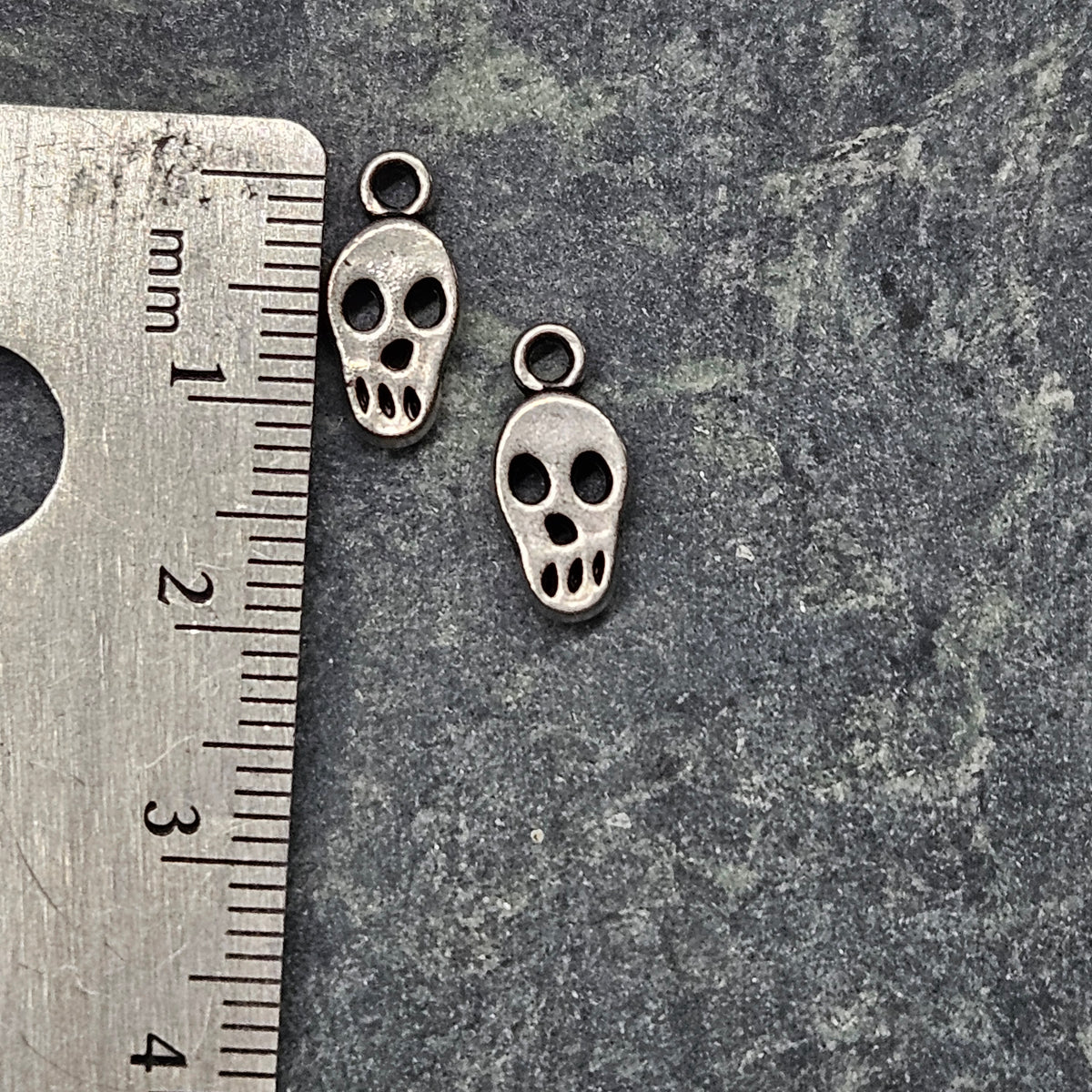 Tiny Skull Charm  -  Lot of 10