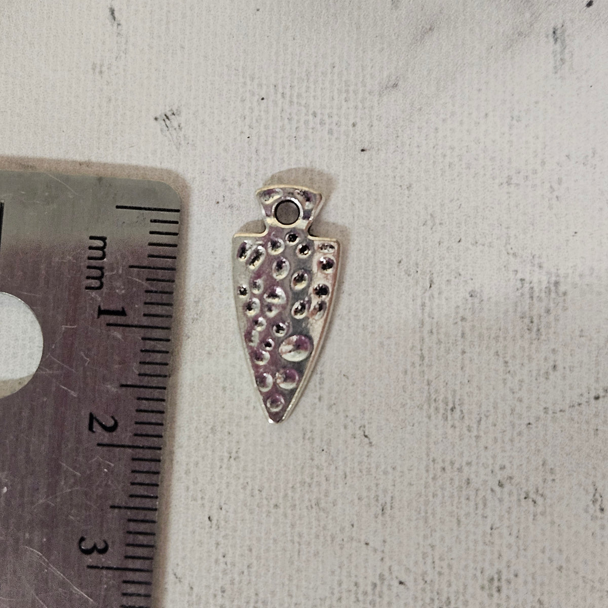 Silver flat arrowhead charm - lot of 9