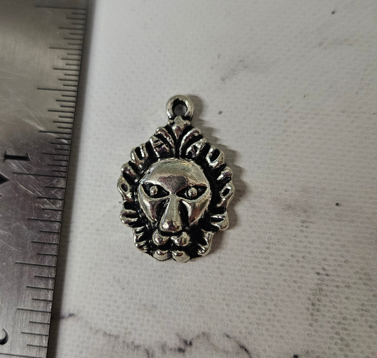 Lion head Charm - lot of 7